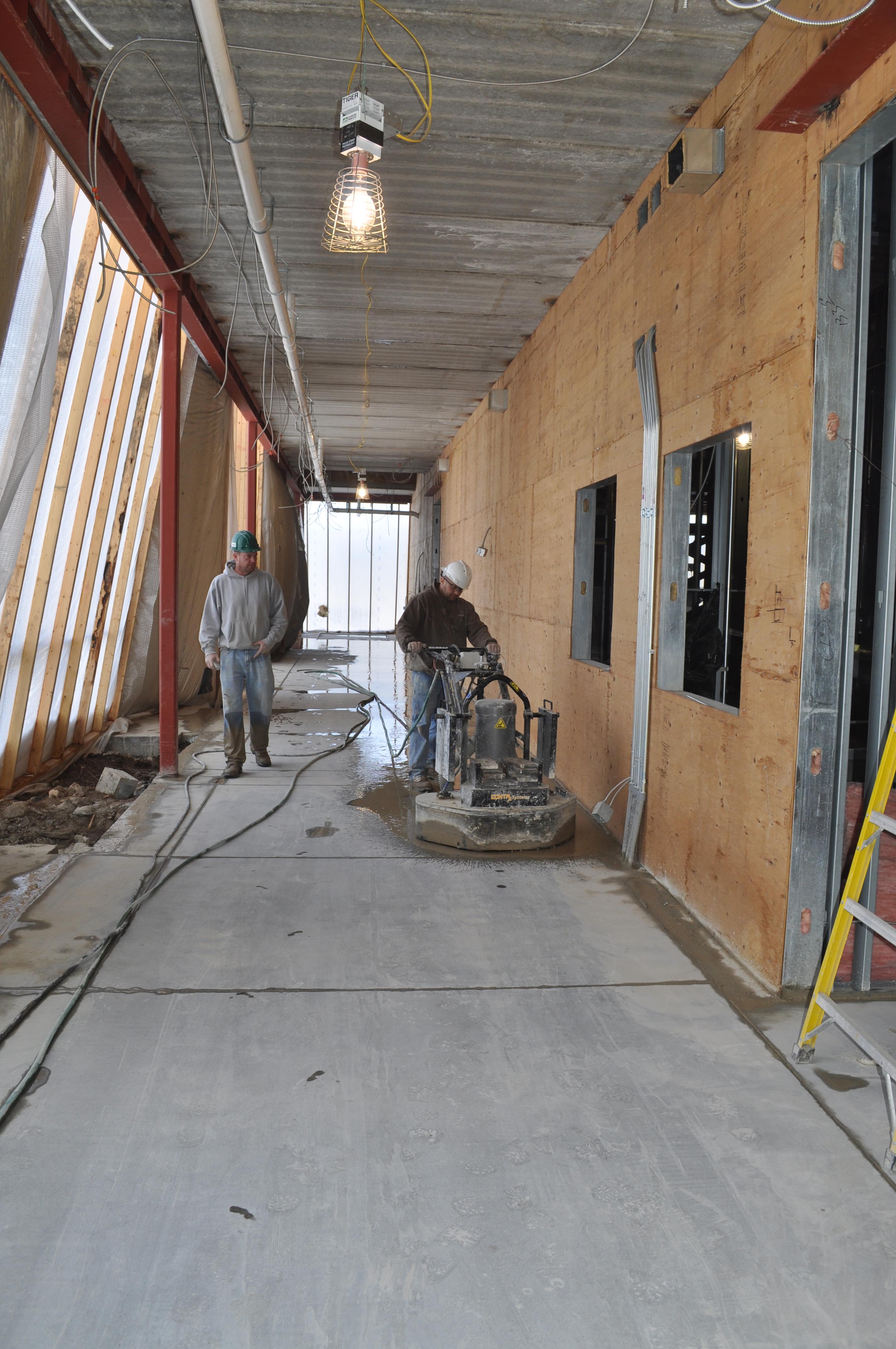 concrete polishing work begins | Building the Maroney Rural Learning Center